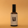 Home Spray con fragancia de lino blanco en envase de vidrio ámbar
