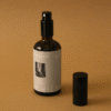 Home Spray con fragancia de lino blanco en envase de vidrio ámbar