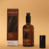 Home Spray con fragancia de mirra arábica y oud en envase de vidrio ámbar