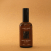 Home Spray con fragancia de mirra arábica y oud en envase de vidrio ámbar