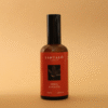 Home Spray con fragancia de neroli y violeta en envase de vidrio ámbar