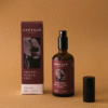 Home Spray con fragancia de orquídea negra y lirio en envase de vidrio ámbar