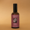Home Spray con fragancia de peonía y gamuza en envase de vidrio ámbar