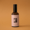 Home Spray con fragancia de rosa blanca y pera en envase de vidrio ámbar