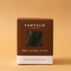 Vela Aromática con fragancia de mirra arábica y oud en envase de vidrio ámbar