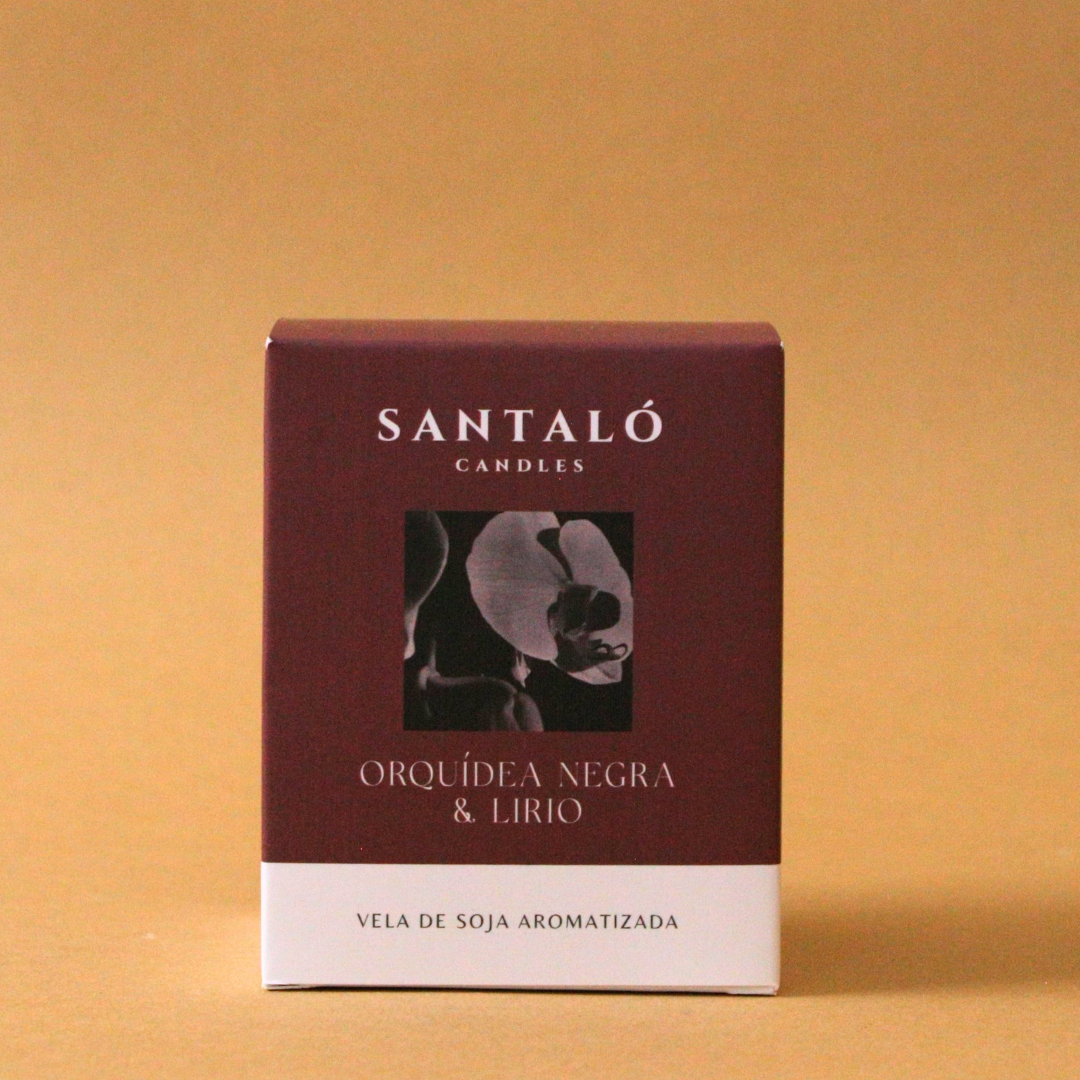 Vela Aromática con fragancia de orquídea negra y lirio en envase de vidrio ámbar