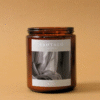 Vela Aromática con fragancia de lino blanco en envase de vidrio ámbar