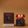 Vela Aromática con fragancia de orquídea negra y lirio en envase de vidrio ámbar