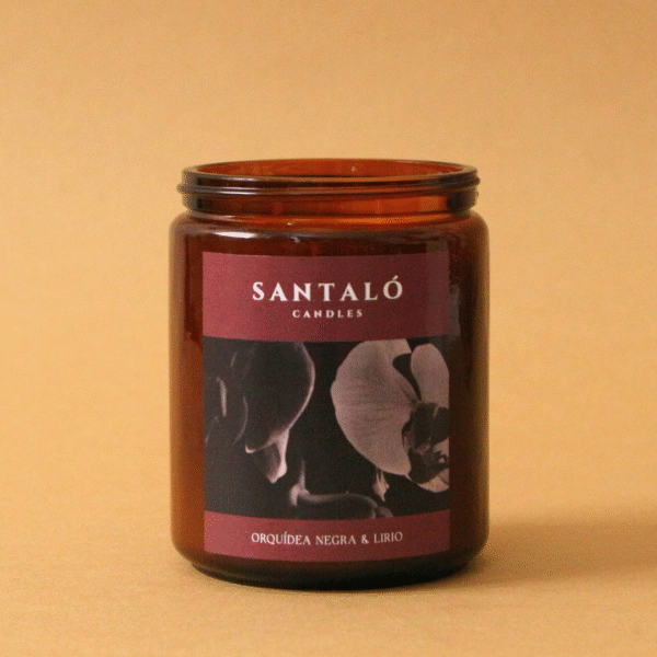 Vela Aromática con fragancia de orquídea negra y lirio en envase de vidrio ámbar